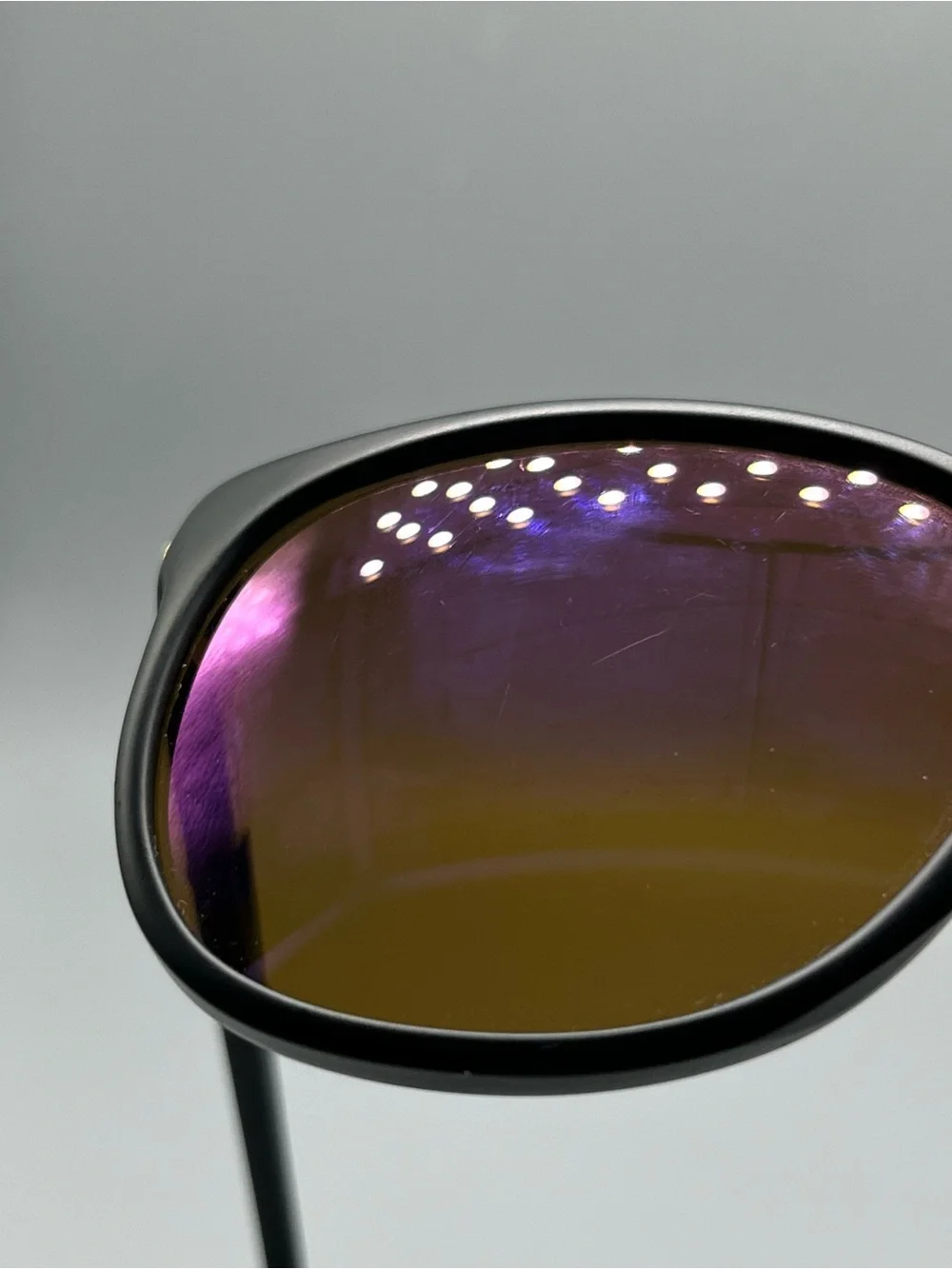Revo Matte Black Sunglasses with Purple Mirrored Lenses